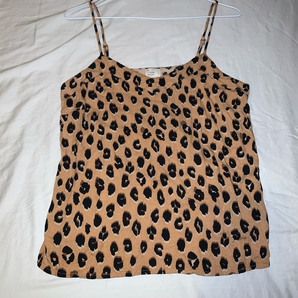 Cheetah tank. size is XS but fits like a S